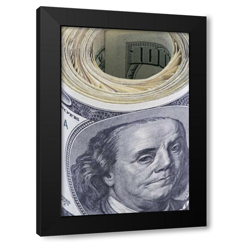 Close-up of a roll of US $100 bills Black Modern Wood Framed Art Print by Flaherty, Dennis