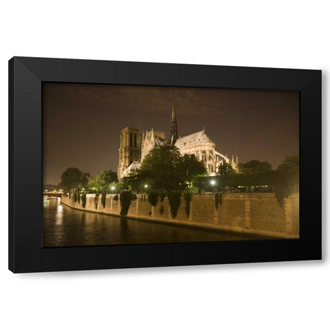 France, Paris Notre Dame Cathedral lit at night Black Modern Wood Framed Art Print by Zuckerman, Jim