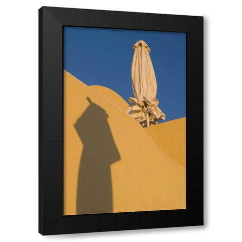 Greece, Santorini Sun umbrella against a wall Black Modern Wood Framed Art Print with Double Matting by Young, Bill