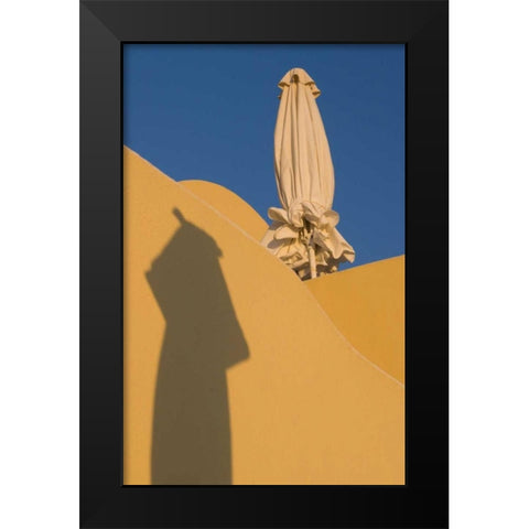 Greece, Santorini Sun umbrella against a wall Black Modern Wood Framed Art Print by Young, Bill
