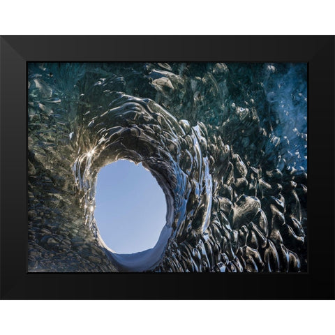 Ice cave at the northern shore of glacial lagoon Jokulsarlon in glacier Breidamerkurjokull Black Modern Wood Framed Art Print by Zwick, Martin