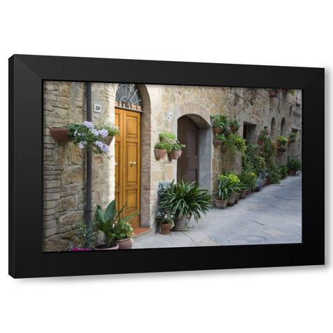 Italy, Pienza Potted plants line narrow streets Black Modern Wood Framed Art Print by Flaherty, Dennis