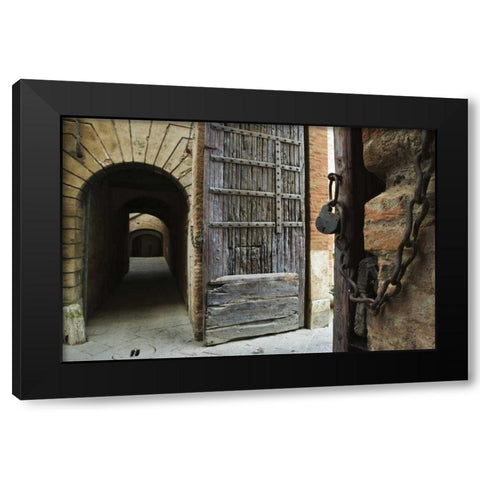 Italy, Tuscany, Fortified gate and an alley Black Modern Wood Framed Art Print by Flaherty, Dennis