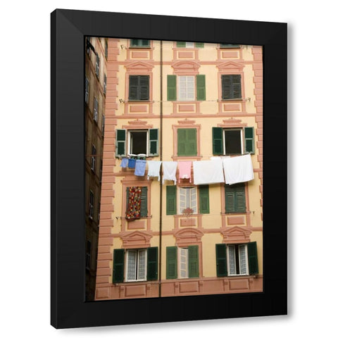 Italy, Camogli Laundry hangs across a building Black Modern Wood Framed Art Print by Kaveney, Wendy