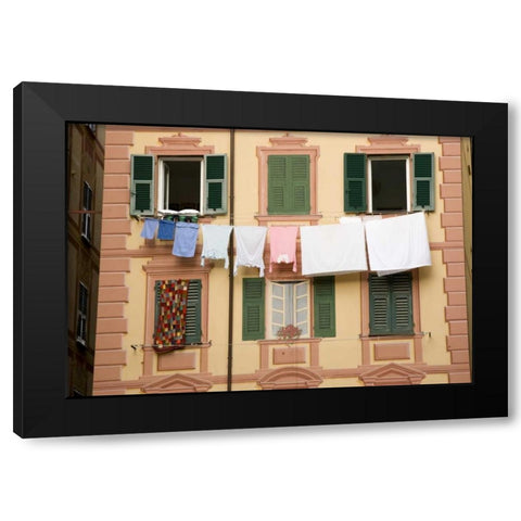 Italy, Camogli Laundry hangs across a building Black Modern Wood Framed Art Print by Kaveney, Wendy