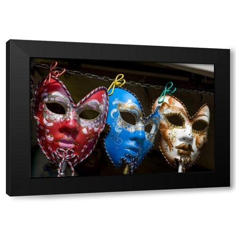 Italy, Venice Display of venetian carnival masks Black Modern Wood Framed Art Print by Kaveney, Wendy