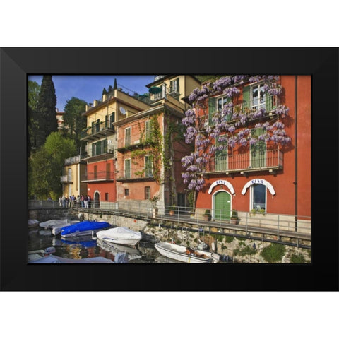 Italy, Varenna Boats moored in village harbor Black Modern Wood Framed Art Print by Flaherty, Dennis