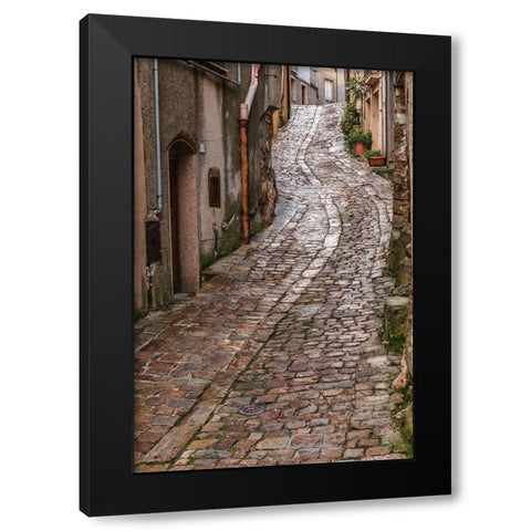 Palermo Province-Geraci Siculo Winding narrow cobblestone street in the town of Geraci Siculo Black Modern Wood Framed Art Print with Double Matting by Wilson, Emily
