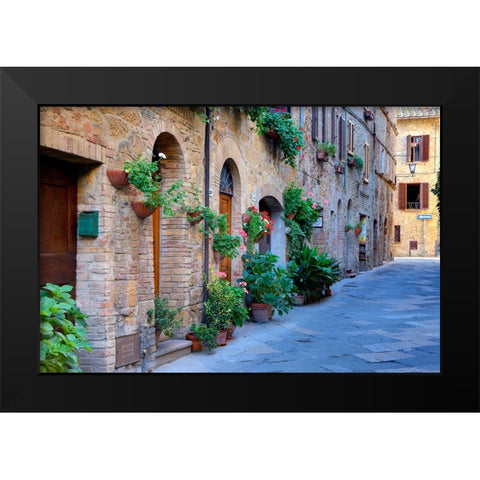 Italy-Tuscany-Pienza Flower pots and potted plants decorate a narrow street in a Tuscany village Black Modern Wood Framed Art Print by Eggers, Julie