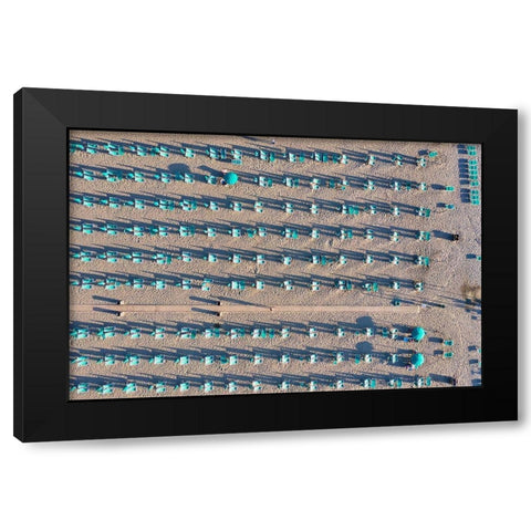 Italy-Tuscany-Torre del Lago Puccini-boathouse and neatly ordered beach chairs and umbrellas Black Modern Wood Framed Art Print by Molinari, Michele