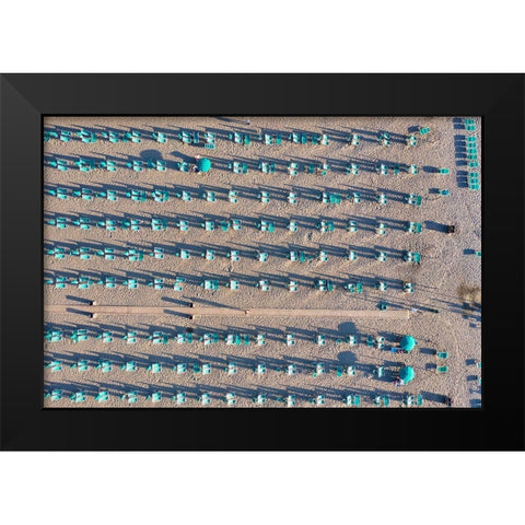 Italy-Tuscany-Torre del Lago Puccini-boathouse and neatly ordered beach chairs and umbrellas Black Modern Wood Framed Art Print by Molinari, Michele