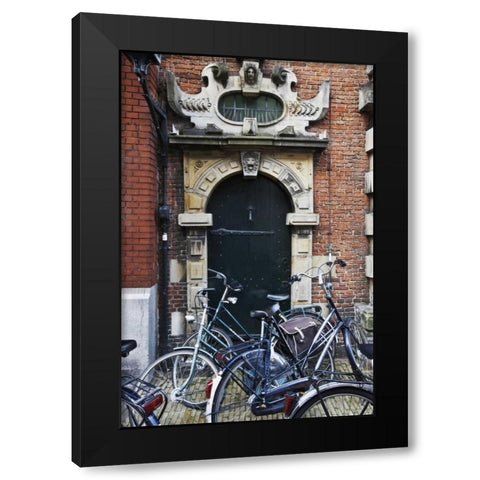 Netherlands, Amsterdam Bicycles by building door Black Modern Wood Framed Art Print with Double Matting by Flaherty, Dennis