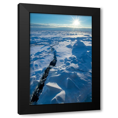 Norway Icescape at 84 degrees north-crack in ice with sunburst Black Modern Wood Framed Art Print with Double Matting by Hopkins, Cindy Miller