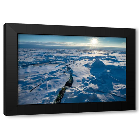 Norway Icescape at 84 degrees north-crack in ice with sunburst Black Modern Wood Framed Art Print with Double Matting by Hopkins, Cindy Miller