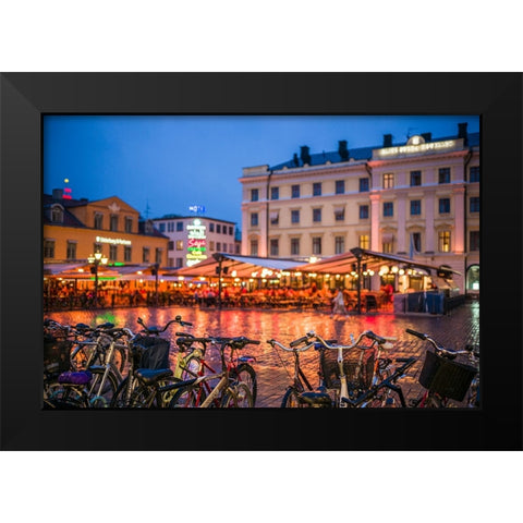 Sweden-Linkoping-cafes and bars on Stora target square-dusk Black Modern Wood Framed Art Print by Bibikow, Walter