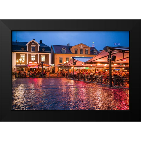 Sweden-Linkoping-cafes and bars on Stora target square-dusk Black Modern Wood Framed Art Print by Bibikow, Walter
