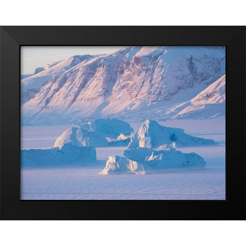 Icebergs frozen into the sea ice of the Uummannaq Fjord System during winter  Black Modern Wood Framed Art Print by Zwick, Martin
