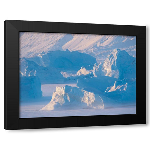 Icebergs frozen into the sea ice of the Uummannaq Fjord System during winter  Black Modern Wood Framed Art Print by Zwick, Martin