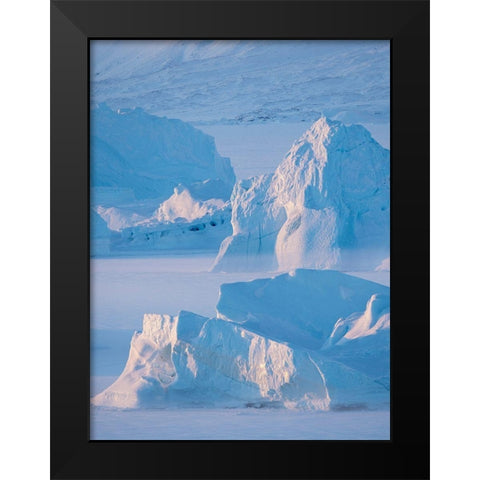 Icebergs frozen into the sea ice of the Uummannaq Fjord System during winter  Black Modern Wood Framed Art Print by Zwick, Martin