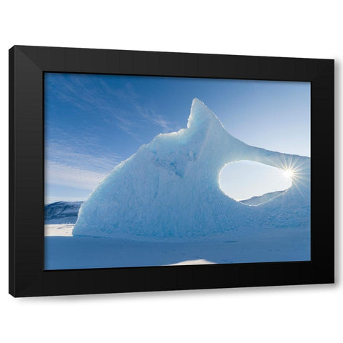 Iceberg frozen into the sea ice of the Uummannaq fjord system during winter-Greenland-Danish Territ Black Modern Wood Framed Art Print by Zwick, Martin