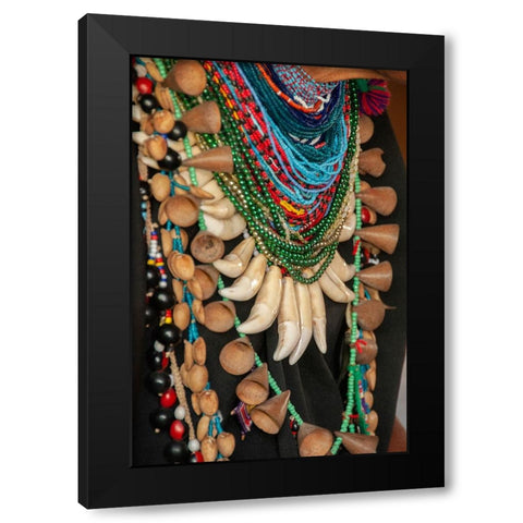 The elaborate regalia of a shaman in the Amazon jungle features jaguar teeth and beads. Black Modern Wood Framed Art Print with Double Matting by Sederquist, Betty