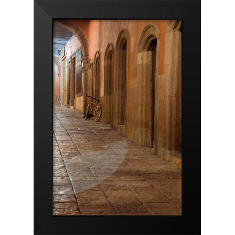 Mexico, Sidewalk with bicycle and archways Black Modern Wood Framed Art Print by Rotenberg, Nancy