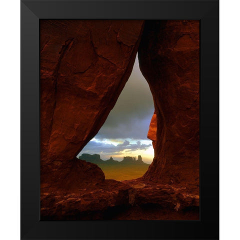 Teardrop arch frames the Monument Valley rock formations on the Utah-Arizona border Black Modern Wood Framed Art Print by SMO