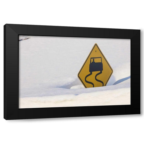 Colorado A slippery when wet sign buried in snow Black Modern Wood Framed Art Print by Grall, Don