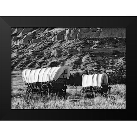 Nebraska, Scotts Bluff Covered wagons in field Black Modern Wood Framed Art Print by Flaherty, Dennis
