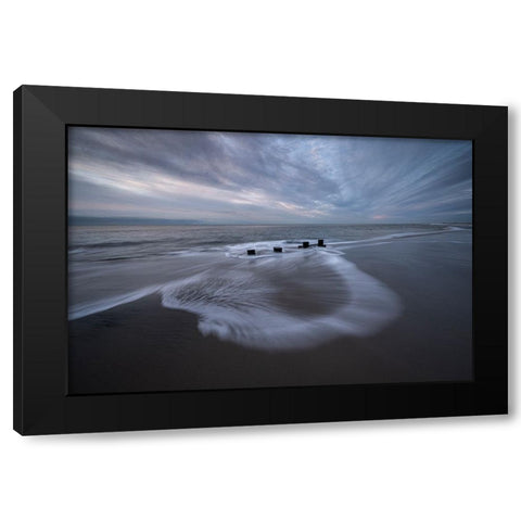 USA-New Jersey-Cape May National Seashore Pier stumps on cloudy seashore sunrise Black Modern Wood Framed Art Print by Jaynes Gallery