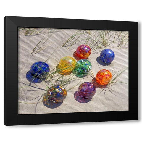 USA, Oregon Colorful glass floats on sand dune Black Modern Wood Framed Art Print by Terrill, Steve