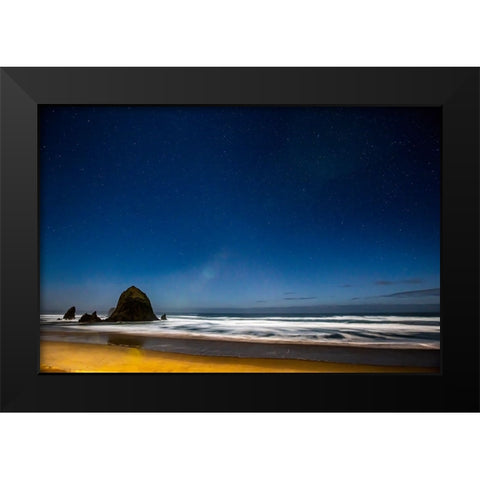 USA- Oregon. Cannon Beach and Haystack Rock stars showing during blue light. Black Modern Wood Framed Art Print by Gulin, Darrell