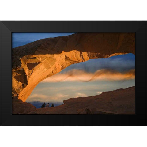 UT, Arches NP Hikers at Skyline arch at sunset Black Modern Wood Framed Art Print by Paulson, Don