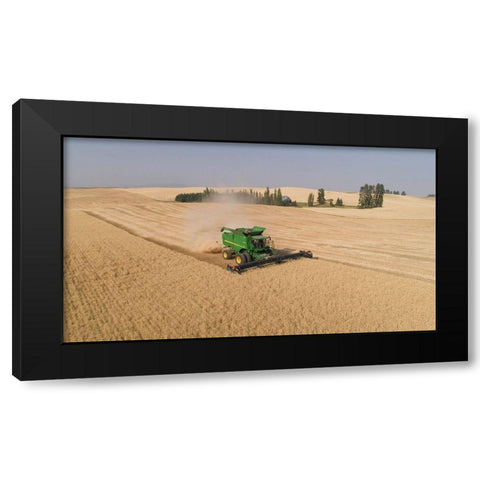 Aerial view of a John Deere combine cutting wheat on a sunny afternoon-Spokane County Black Modern Wood Framed Art Print by Probst, Greg