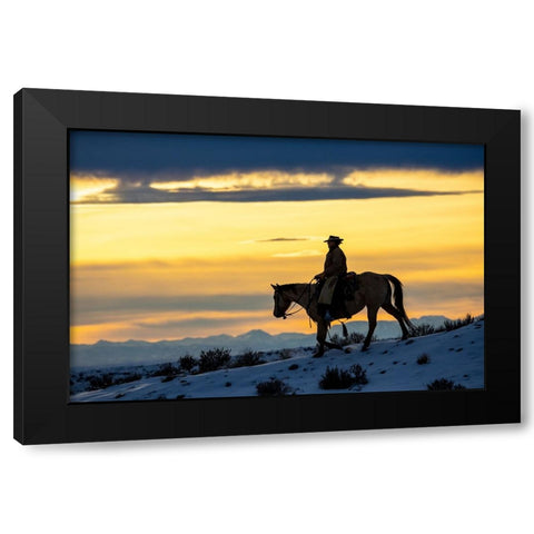 USA- Shell- Wyoming. Hideout Ranch cowgirl silhouetted on horseback at sunset.  Black Modern Wood Framed Art Print by Gulin, Darrell