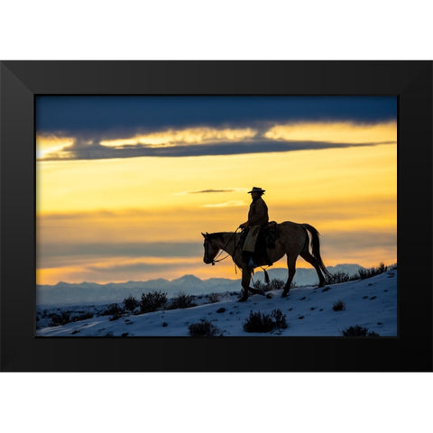 USA- Shell- Wyoming. Hideout Ranch cowgirl silhouetted on horseback at sunset.  Black Modern Wood Framed Art Print by Gulin, Darrell
