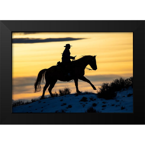USA- Shell- Wyoming. Hideout Ranch cowgirl silhouetted on horseback at sunset.  Black Modern Wood Framed Art Print by Gulin, Darrell