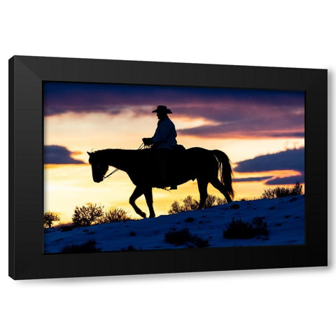 USA- Shell- Wyoming. Hideout Ranch cowboy on horseback silhouetted at sunset.  Black Modern Wood Framed Art Print with Double Matting by Gulin, Darrell
