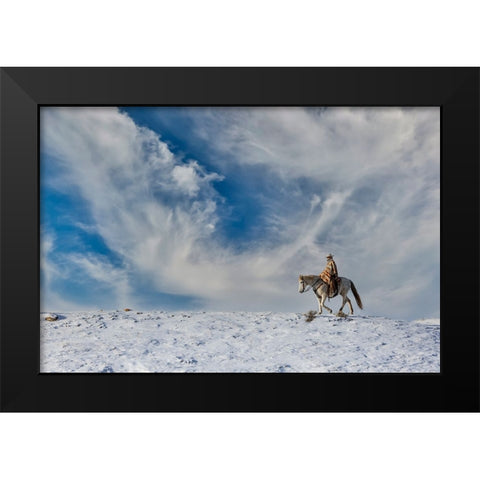 USA- Shell- Wyoming. Hideout Ranch cowgirl on horseback riding on ridgeline snow.  Black Modern Wood Framed Art Print by Gulin, Darrell