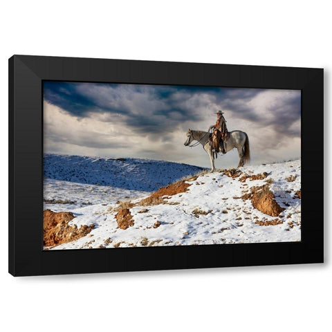 USA- Shell- Wyoming. Hideout Ranch cowgirl on horseback riding on ridgeline snow.  Black Modern Wood Framed Art Print by Gulin, Darrell