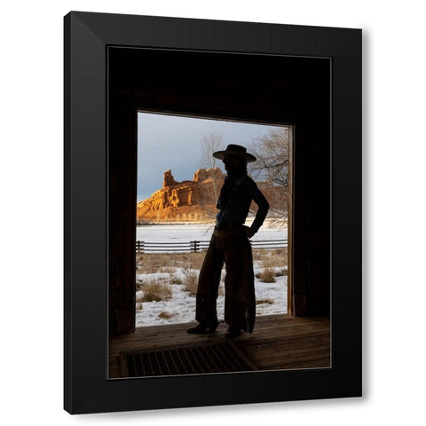 USA- Shell- Wyoming. Hideout Ranch with cowgirl silhouetted in doorway of log cabin.  Black Modern Wood Framed Art Print by Gulin, Darrell