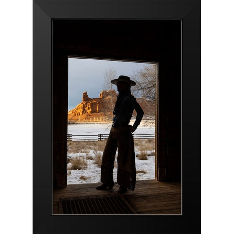 USA- Shell- Wyoming. Hideout Ranch with cowgirl silhouetted in doorway of log cabin.  Black Modern Wood Framed Art Print by Gulin, Darrell