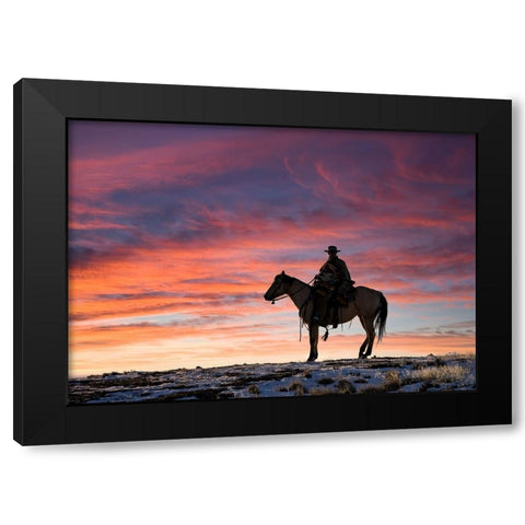 USA- Shell- Wyoming. Hideout Ranch cowgirl silhouetted on horseback at sunset.  Black Modern Wood Framed Art Print by Gulin, Darrell