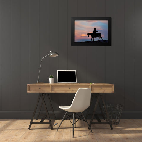USA- Shell- Wyoming. Hideout Ranch cowgirl silhouetted on horseback at sunset.  Black Modern Wood Framed Art Print by Gulin, Darrell