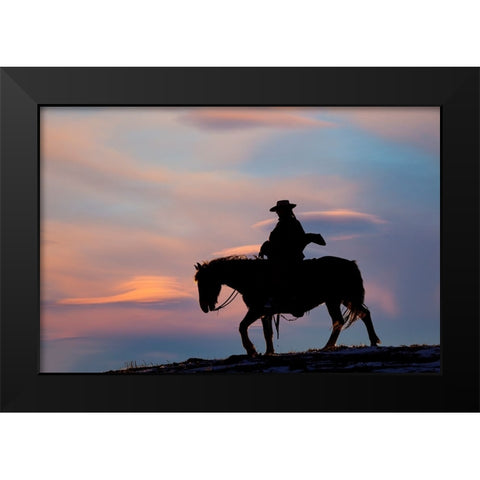 USA- Shell- Wyoming. Hideout Ranch cowgirl silhouetted on horseback at sunset.  Black Modern Wood Framed Art Print by Gulin, Darrell