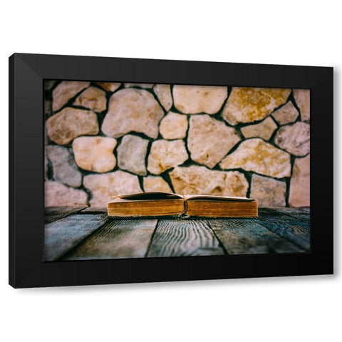 Old Open Book On Old Wooden Table On A Background Of Stone Walls Black Modern Wood Framed Art Print by Solovie, Andre