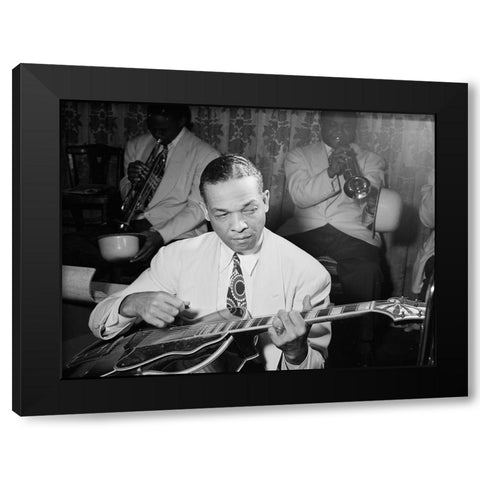 Fred Guy playing guitar at the Aquarium-New York 1946 Black Modern Wood Framed Art Print with Double Matting by Gottlieb, William