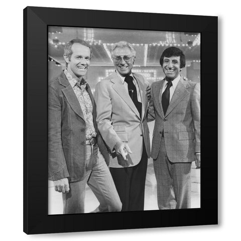 Mike Farrell, Allen Ludden, Jamie Farr, Stumpers, 1976 Black Modern Wood Framed Art Print by Vintage Hollywood Archive