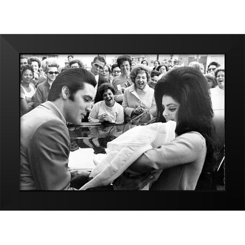 Elvis Presley and Priscilla with Lisa Marie-1968 Black Modern Wood Framed Art Print by Vintage Music Archive