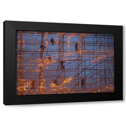 The festival runs Ship Fire Black Modern Wood Framed Art Print with Double Matting by Intarob, Sarawut